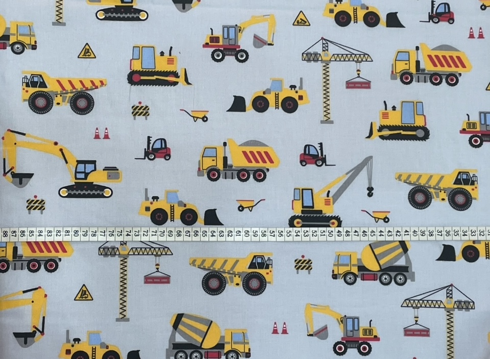 Gyerekmintás pamutvászon munkagép mintájú szürke alapon 160cm